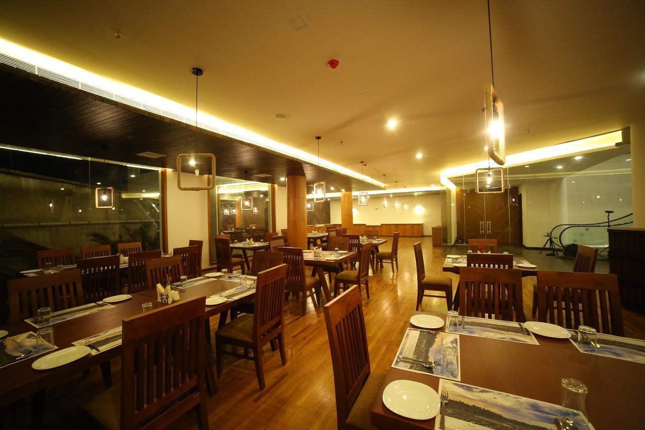 Woodies Bleisure Hotel Kozhikode Exterior foto
