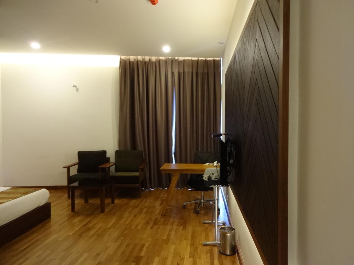 Woodies Bleisure Hotel Kozhikode Exterior foto